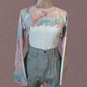 Bolero long sleeve, shrug. Marble fringe color light pink and blue. Sz women’s M